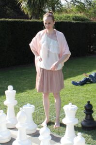 Astrid playing giant chess