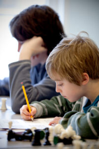 chess puzzles have a way of absorbing young minds